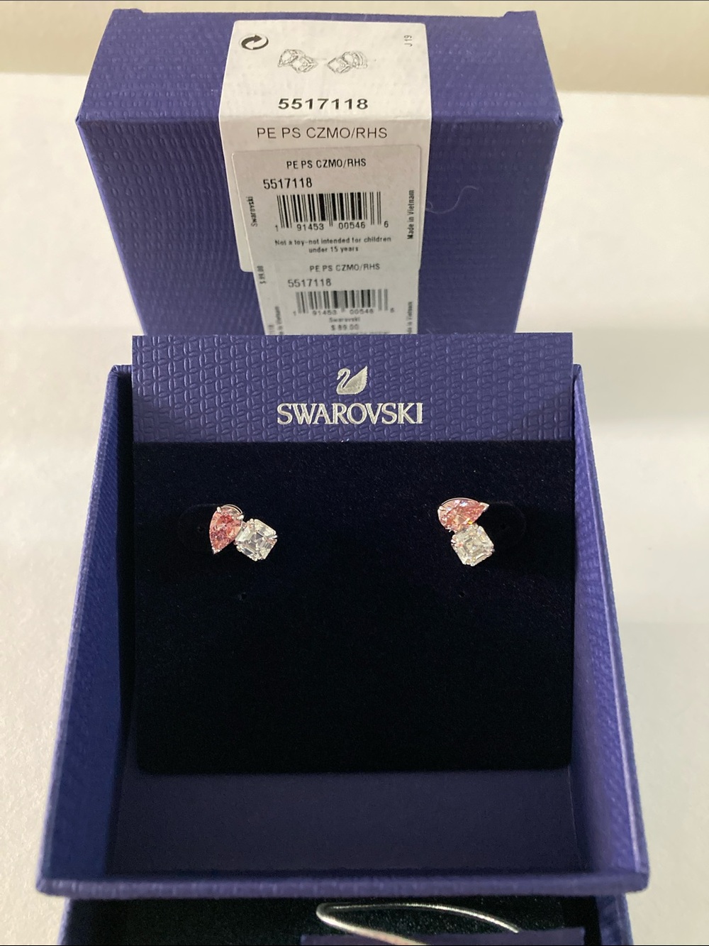 Swarovski attract soul pierced earrings in rhodium plating